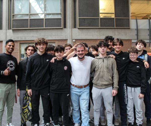 Mr. Paolino '06 and students post Fund-Razor 